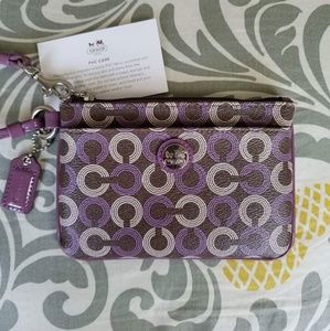 Coach NWOT Purple and Brown PVC Wristlet